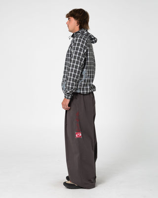 Man wearing Mista Mista Elastic Pant in Carbon