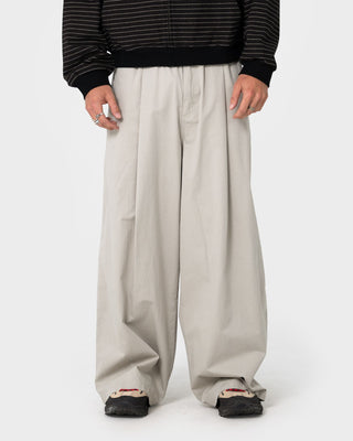 Man wearing Mista Mista Elastic Pant in Stone