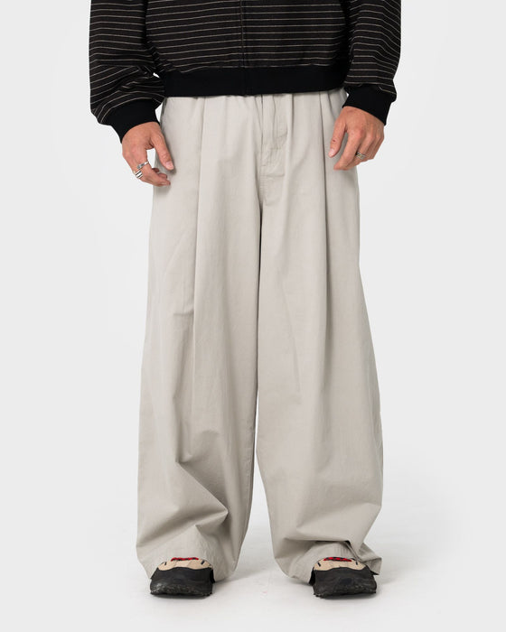 man-wearing-mista-mista-elastic-pant-in-stone