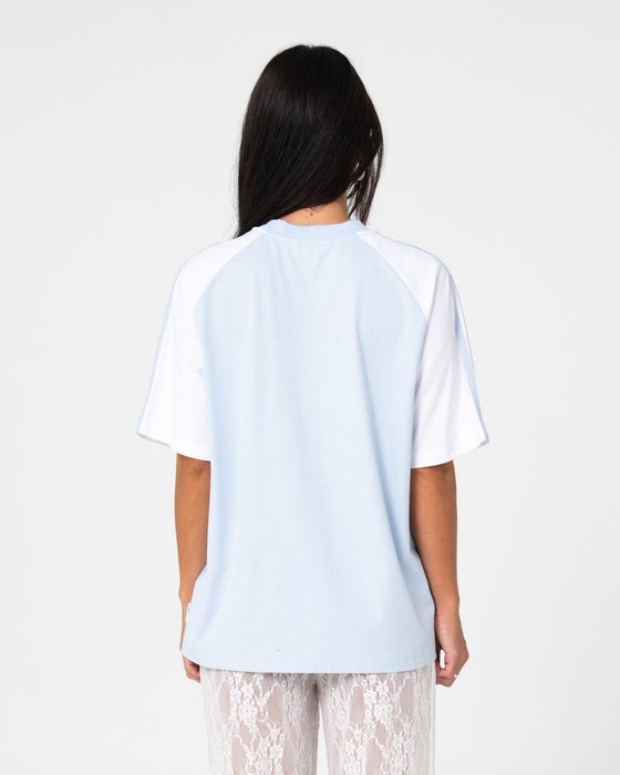 woman-wearing-alex-raglan-oversize-tee-in-retro-blue-white