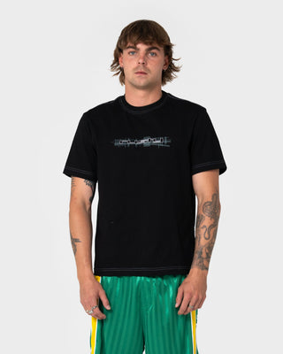 Man wearing Check Wise Short Sleeve Tee in Black