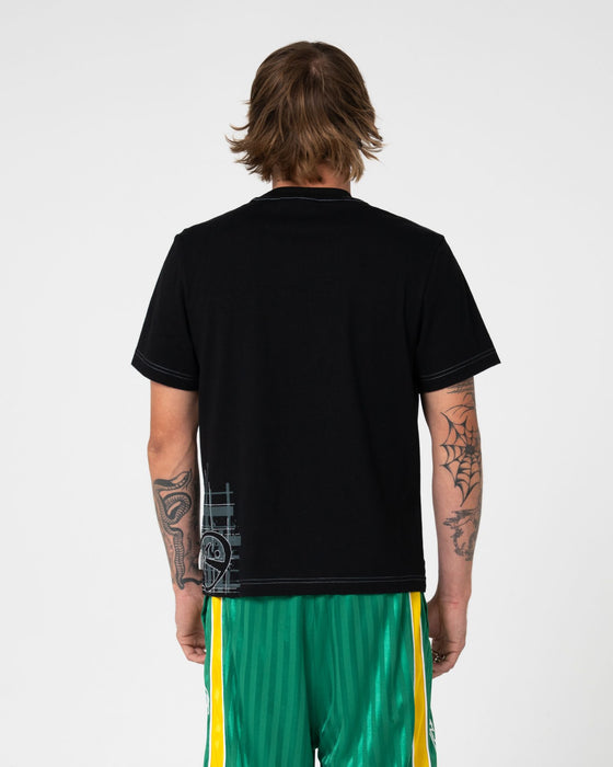 man-wearing-check-wise-short-sleeve-tee-in-black