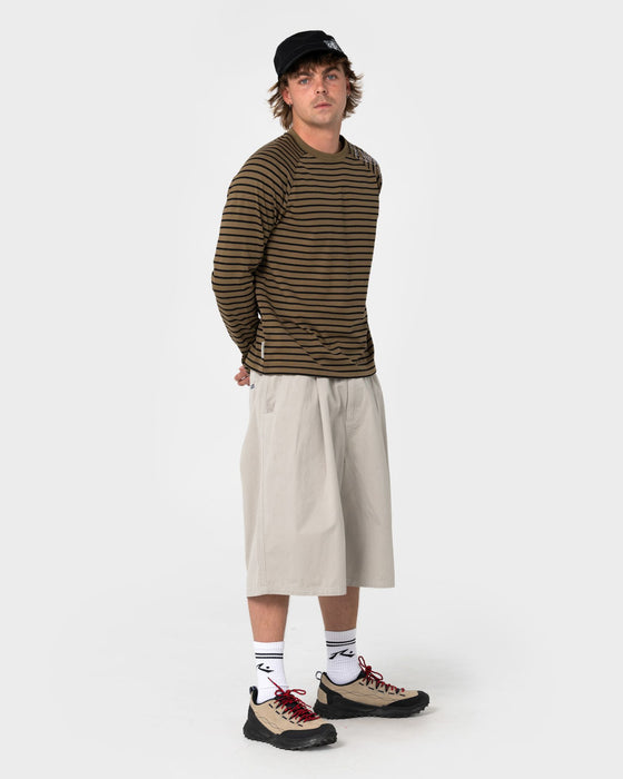 man-wearing-huff-n-puff-long-sleeve-tee-in-savanna