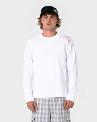 Man wearing Huff N Puff Long Sleeve Tee in White