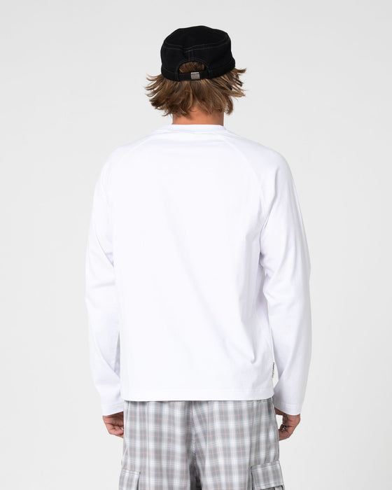 man-wearing-huff-n-puff-long-sleeve-tee-in-white