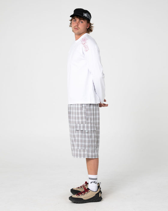 man-wearing-huff-n-puff-long-sleeve-tee-in-white