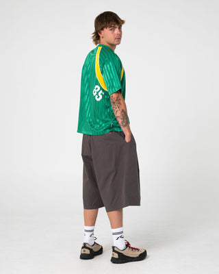 Man wearing Woopty Short Sleeve Sports Tee in Boston Green