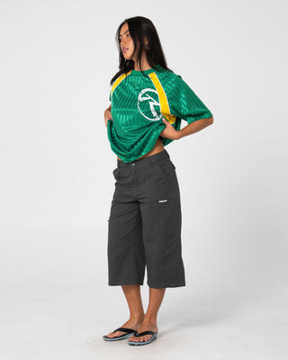 Man wearing Woopty Short Sleeve Sports Tee in Boston Green