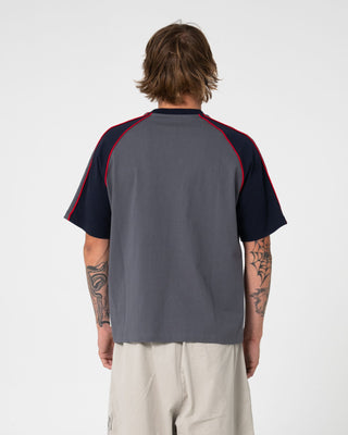 Man wearing Tekka Short Sleeve Tee in Steel