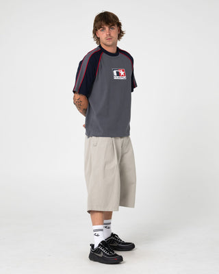 Man wearing Tekka Short Sleeve Tee in Steel