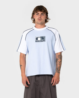 Man wearing Tekka Short Sleeve Tee in Sky Blue