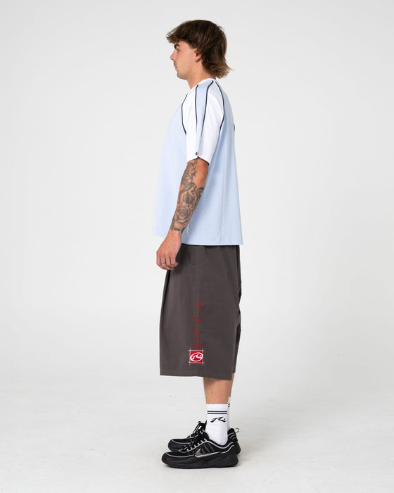 man-wearing-tekka-short-sleeve-tee-in-sky-blue