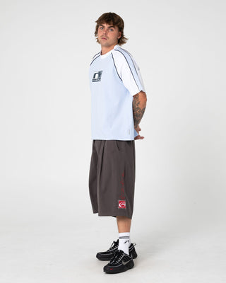 Man wearing Tekka Short Sleeve Tee in Sky Blue