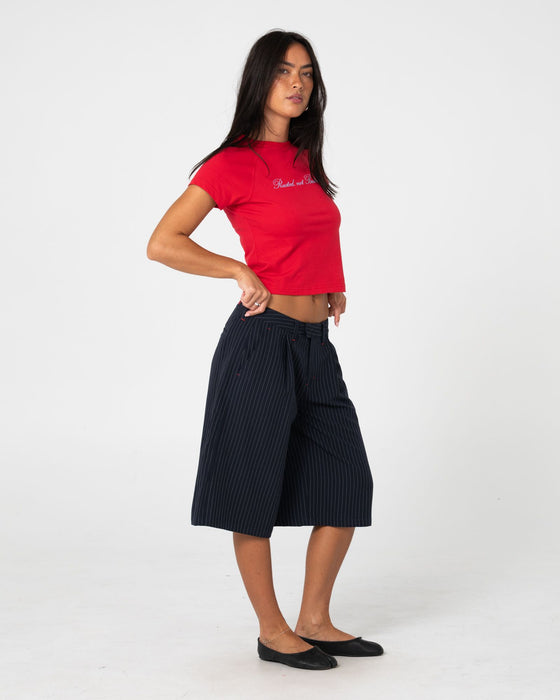 woman-wearing-big-bad-finance-mommy-low-rise-short-in-navy-pinstripe