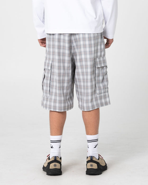 man-wearing-screwdriva-elastic-cargo-short-in-stone-grey