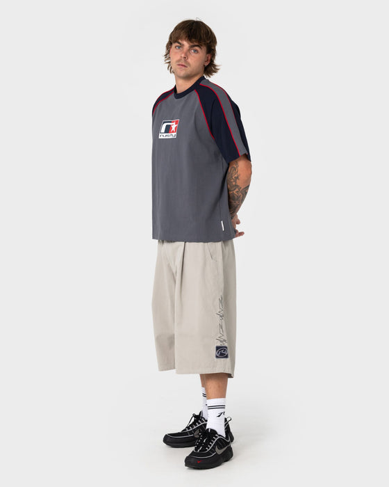 man-wearing-mista-mista-elastic-short-in-stone