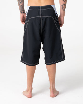 Man wearing Oxecutioner Fixed Waist Boardshort in Black