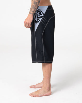 Man wearing Oxecutioner Fixed Waist Boardshort in Black