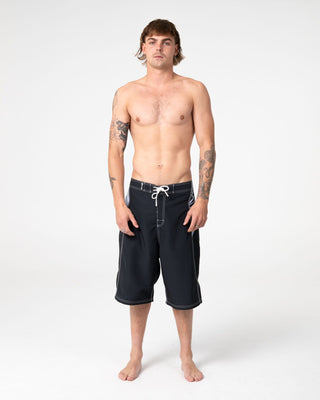 Man wearing Oxecutioner Fixed Waist Boardshort in Black