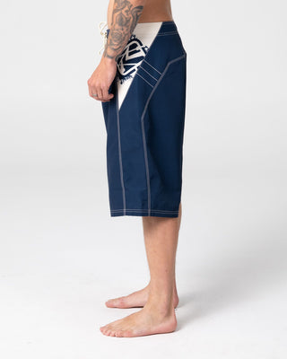 Man wearing Oxecutioner Fixed Waist Boardshort in Navy Blue