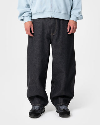 Man wearing Reload Cacoon Jean in Raw Dawg Black