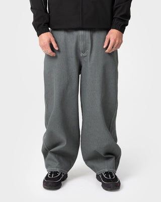 Man wearing Reload Cacoon Jean in Raw Dawg Slate