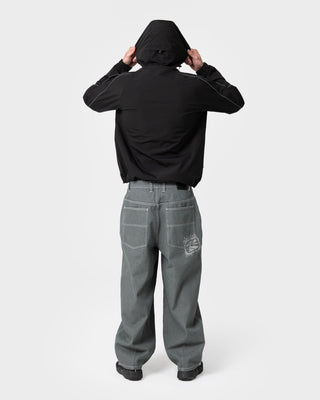 Man wearing Reload Cacoon Jean in Raw Dawg Slate