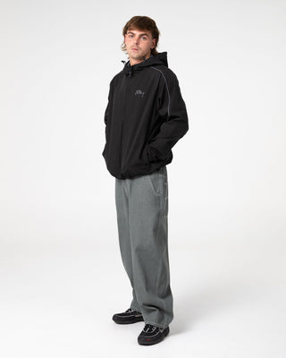 Man wearing Reload Cacoon Jean in Raw Dawg Slate