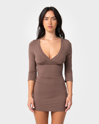 Woman wearing Rikki Vee Neck Dress in Java