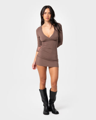 Woman wearing Rikki Vee Neck Dress in Java