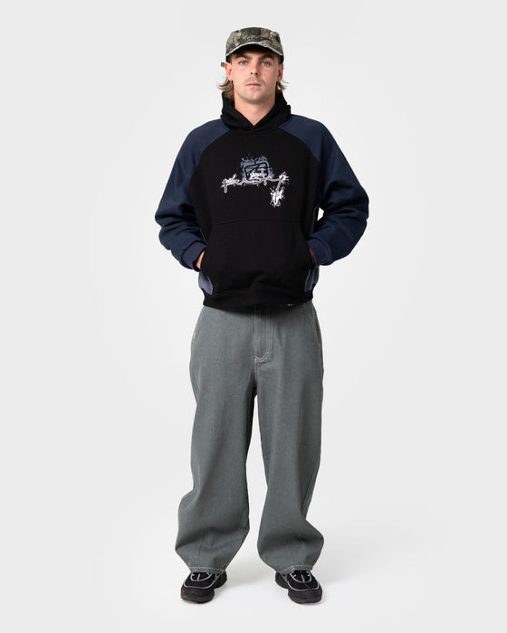 man-wearing-splish-splash-hooded-fleece-in-black