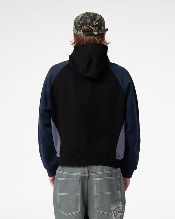 man-wearing-splish-splash-hooded-fleece-in-black