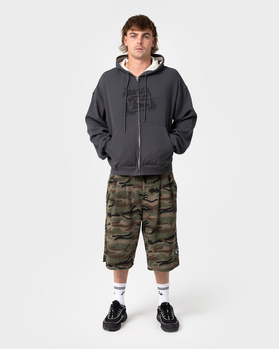 man-wearing-revolt-waffle-zip-thru-hooded-fleece-in-steel