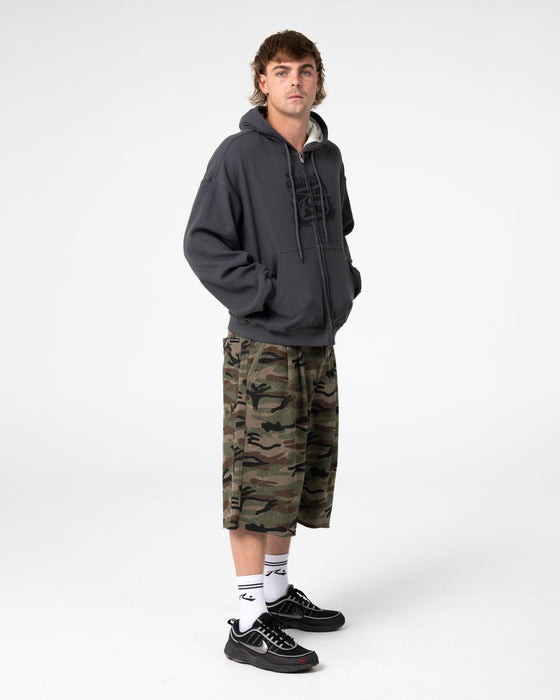 man-wearing-revolt-waffle-zip-thru-hooded-fleece-in-steel