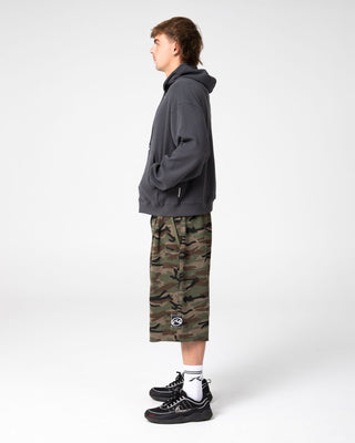 Man wearing Revolt Waffle Zip Thru Hooded Fleece in Steel