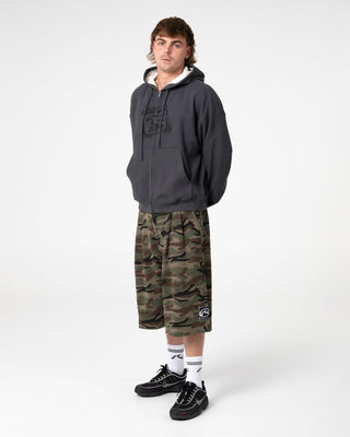 Man wearing Revolt Waffle Zip Thru Hooded Fleece in Steel