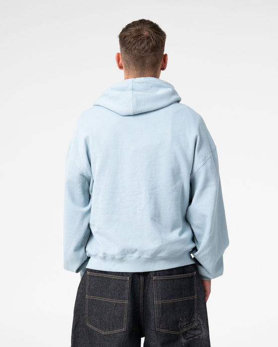 man-wearing-revolt-waffle-zip-thru-hooded-fleece-in-sky-blue