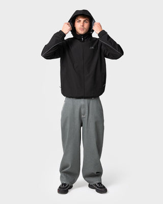 Man wearing Scyther Rain Jacket in Black