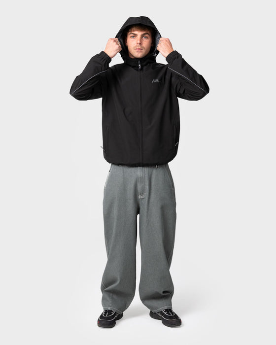 man-wearing-scyther-rain-jacket-in-black
