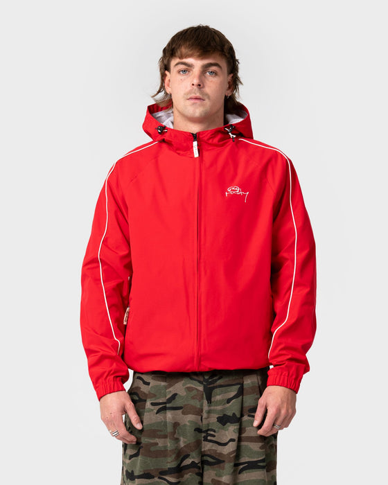 man-wearing-scyther-rain-jacket-in-vintage-red