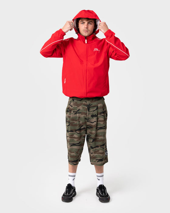 man-wearing-scyther-rain-jacket-in-vintage-red