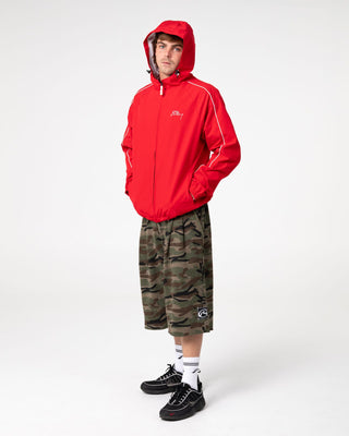 Man wearing Scyther Rain Jacket in Vintage Red