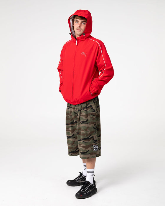 man-wearing-scyther-rain-jacket-in-vintage-red