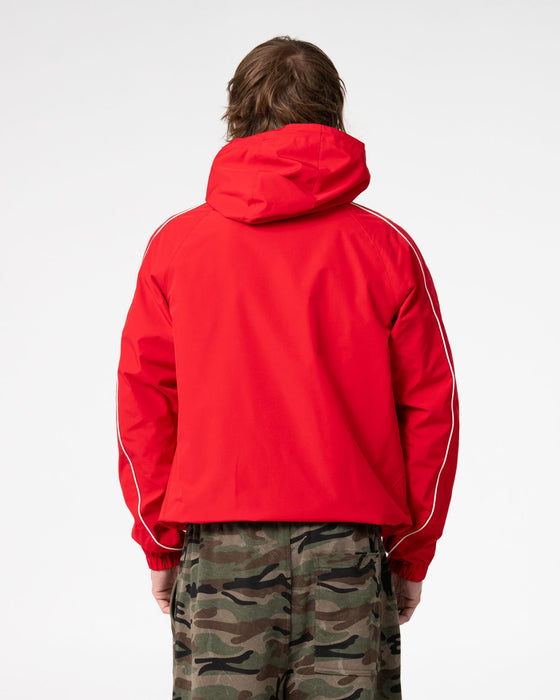 man-wearing-scyther-rain-jacket-in-vintage-red