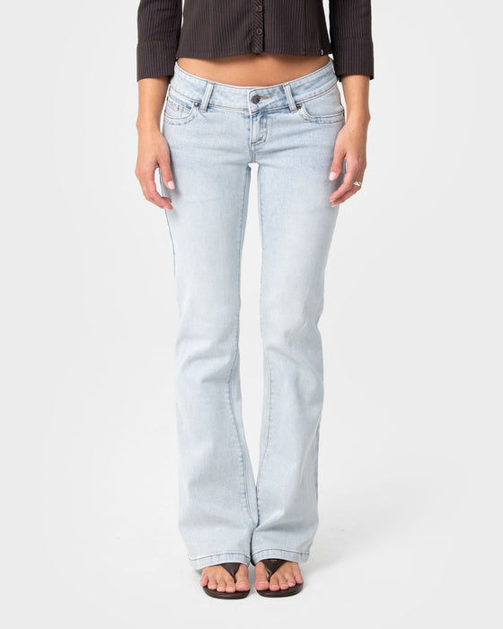 woman-wearing-lindsay-luv-low-rise-boot-leg-denim-jean-in-worn-out