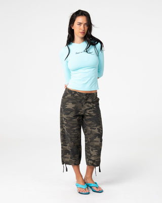 Woman wearing Cameron Camo Low Rise Relaxed Capri Pant in Camo