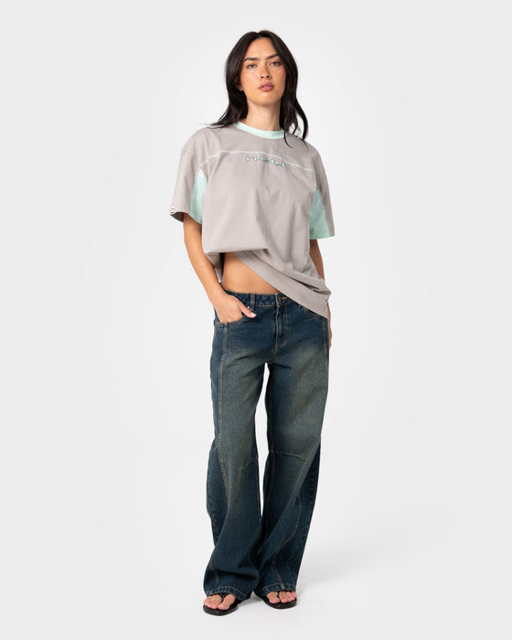 woman-wearing-cyberwaves-oversize-short-sleeve-tee-in-grey-mint