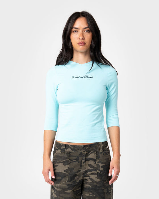 woman-wearing-vroom-3-4-sleeve-fitted-tee-in-powder-aqua