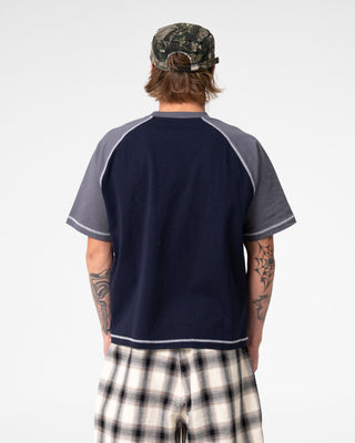 Man wearing Decoy Short Sleeve Tee in Navy Blue
