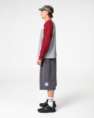 Man wearing Shadow Waffle Long Sleeve Tee in Grey Marle